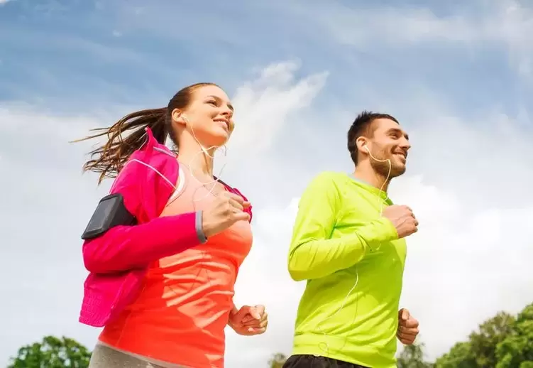 Men and women run to be in good shape